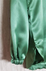 Green V-Neck Buttoned Silk Blouse.